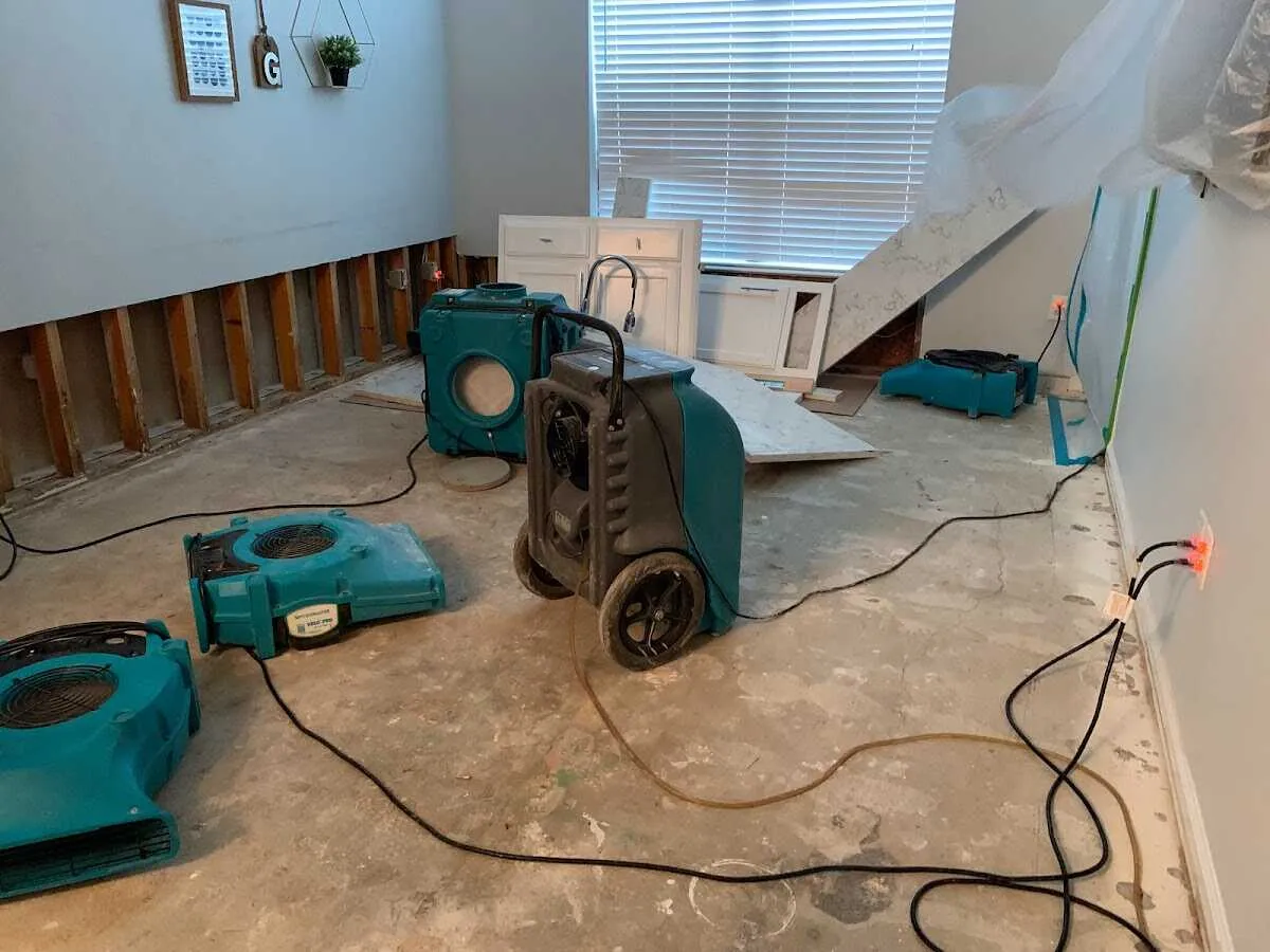 Dehumidifier in flood-cut room for Water Damage Restoration in Baytown